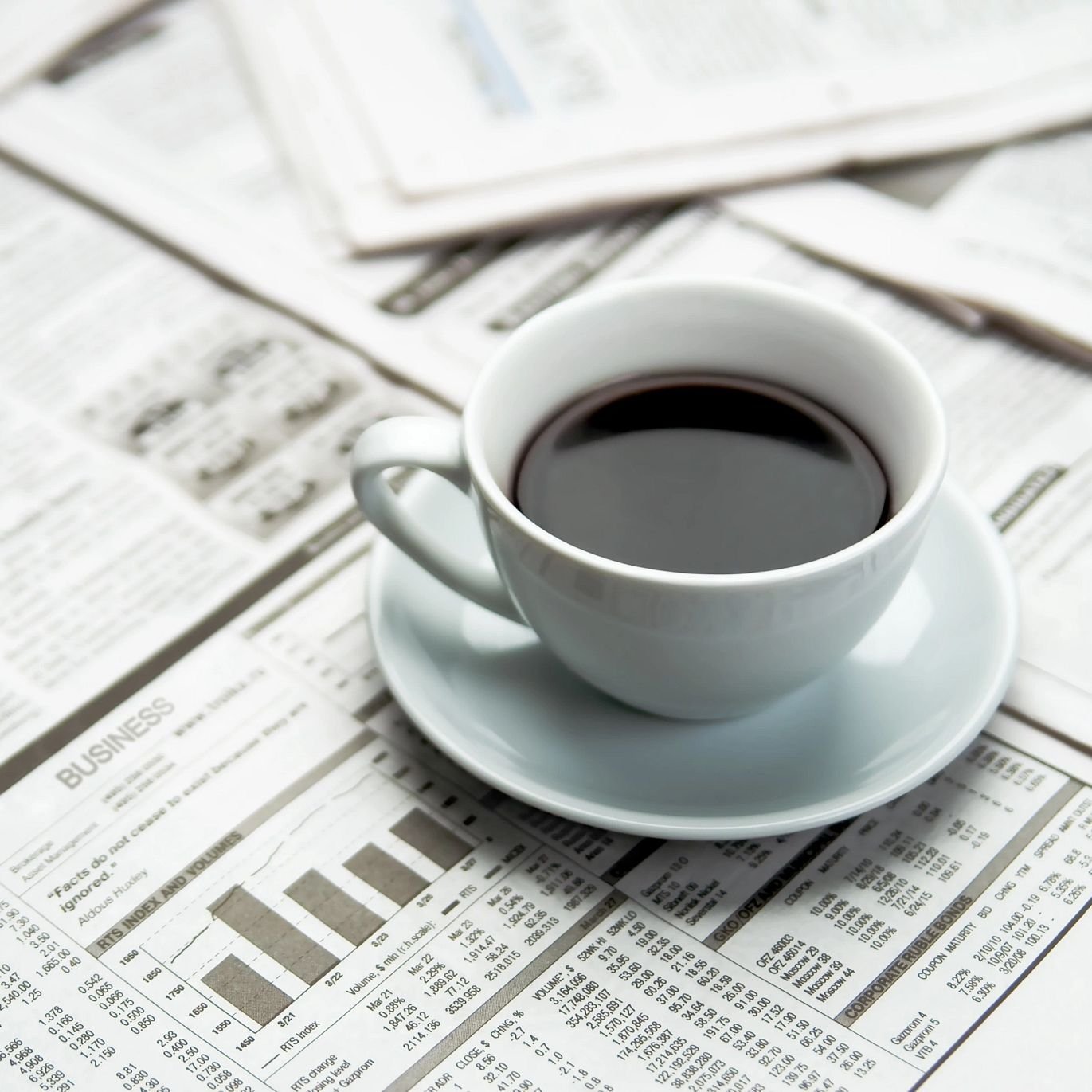 coffee on a newspaper - Shamrock Carpets in Uniontown, PA