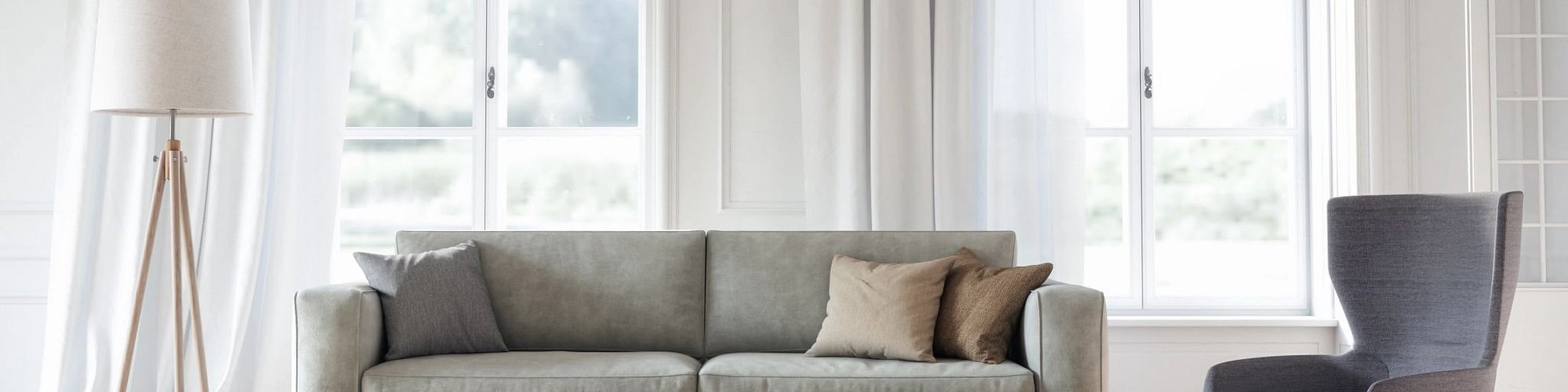 grey sofa, chair and lamp in front of window - shamrock carpets in pa